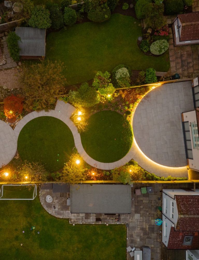 Garden design Crosby with circular patio and lawn by Lucy Frank Garden Design